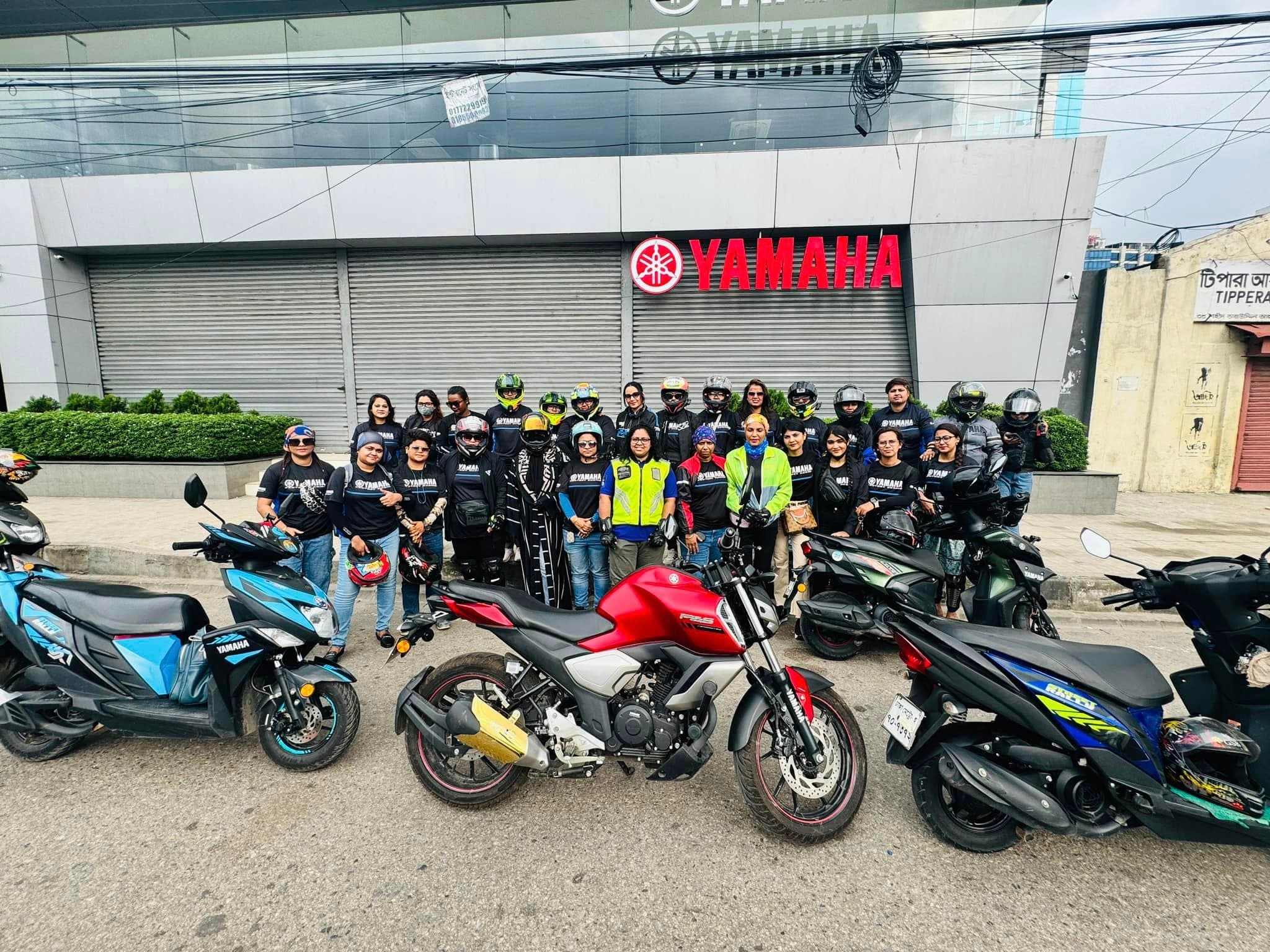 A crew of riders together at the Yamaha showroom before departure.